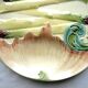 Assiette art nouveau à asperges en barbotine signée lunéville