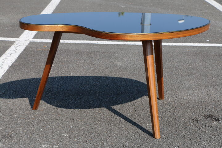 Bean coffee table with black glass top