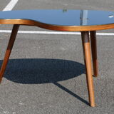 Bean coffee table with black glass top