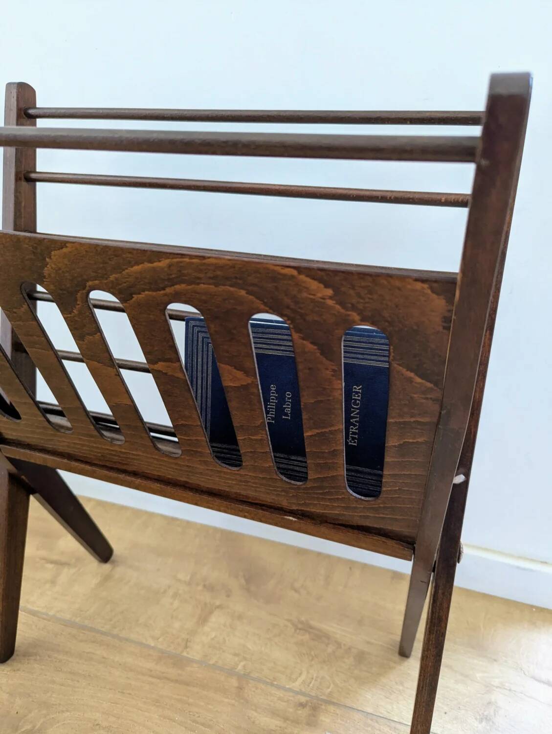 Vintage wooden magazine rack with Scandinavian design