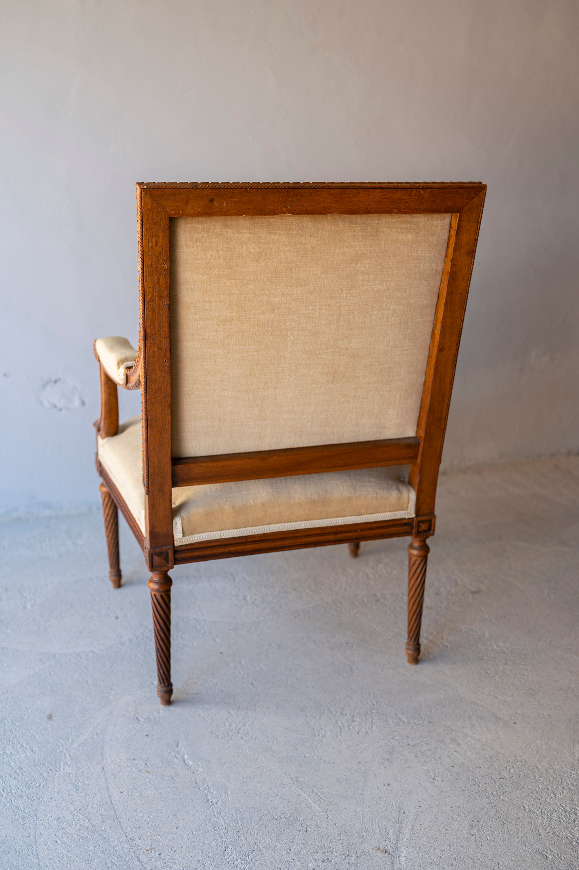 Antique armchair in solid wood