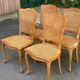 4 Louis XV dining chairs in light solid oak with caning.