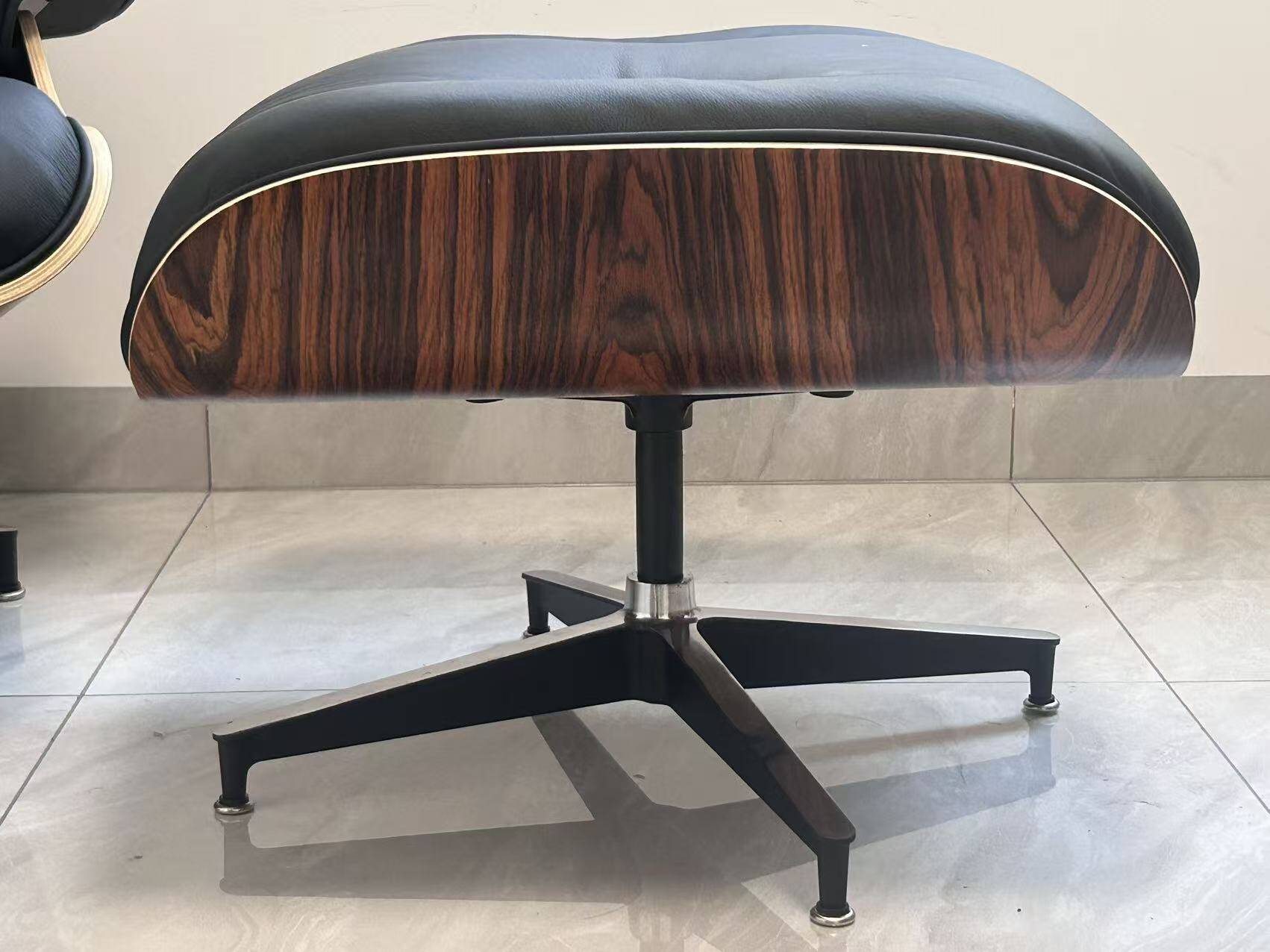 Lounge chair and ottoman by Herman Miller Charles & Ray Eames, rosewood.