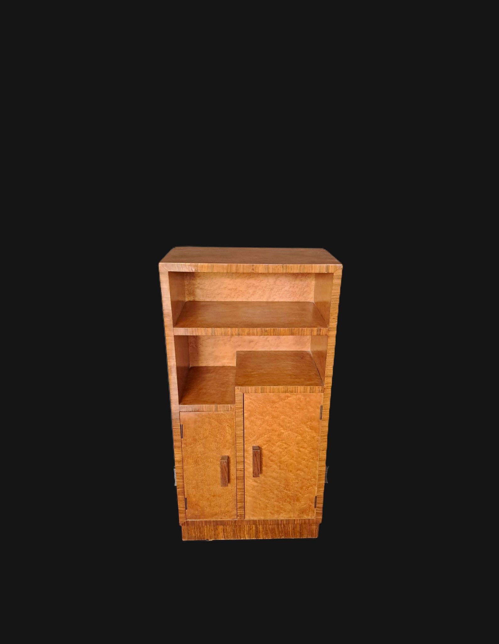 Art Deco cabinet in speckled maple veneer with asymmetrical shelves.