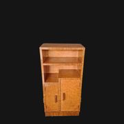 Art Deco cabinet in speckled maple veneer with asymmetrical shelves.