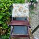 Folding footrest with vintage embroidery