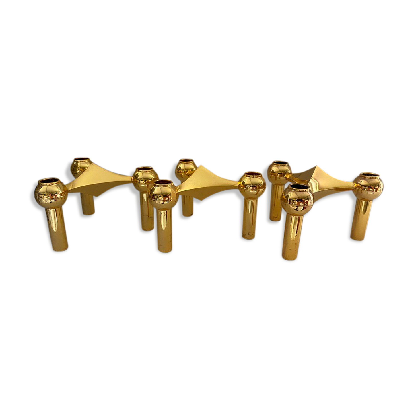 Series of 3 gold Nagel modular candlesticks