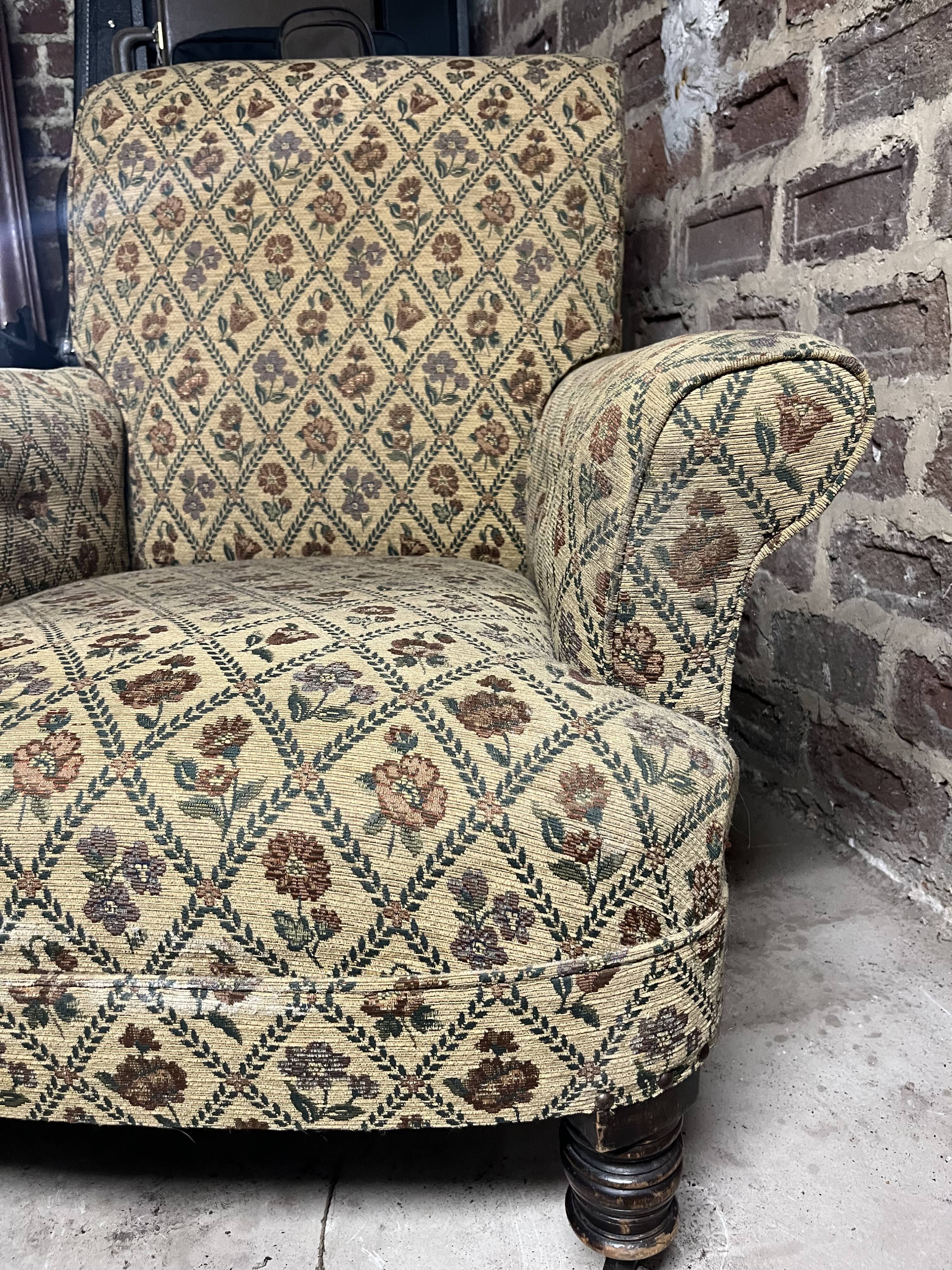 Beige armchair upholstered flowers