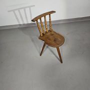 Old farmers tripod chair for decorative use
