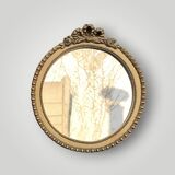 Antique small round wall mirror in gold resin - love knot