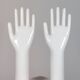Pair of authentic vintage jewellery displays in industrial porcelain representing hands.