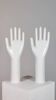 Pair of authentic vintage jewellery displays in industrial porcelain representing hands.