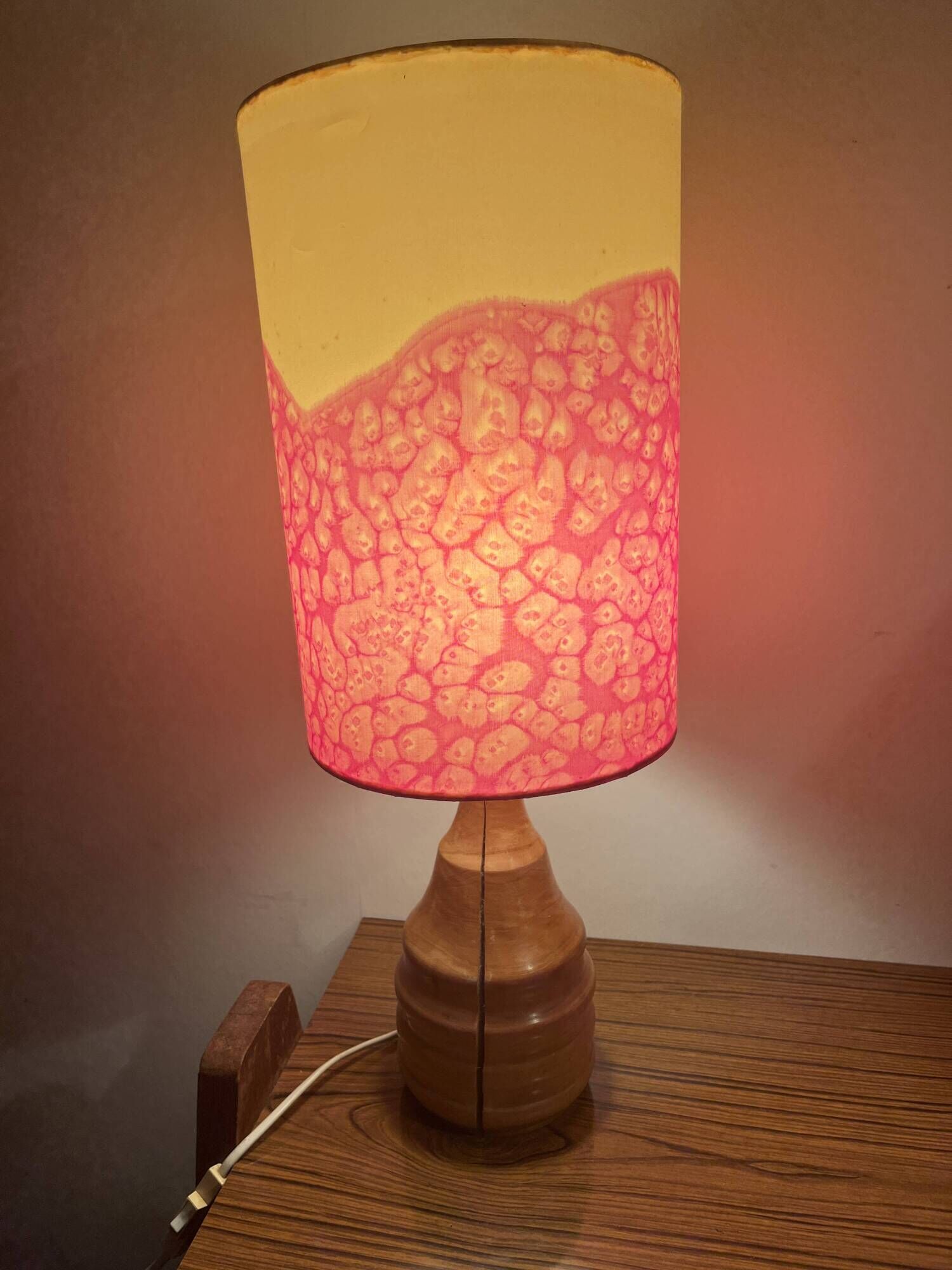 Vintage lamp with a carved wooden base from the 1970s.