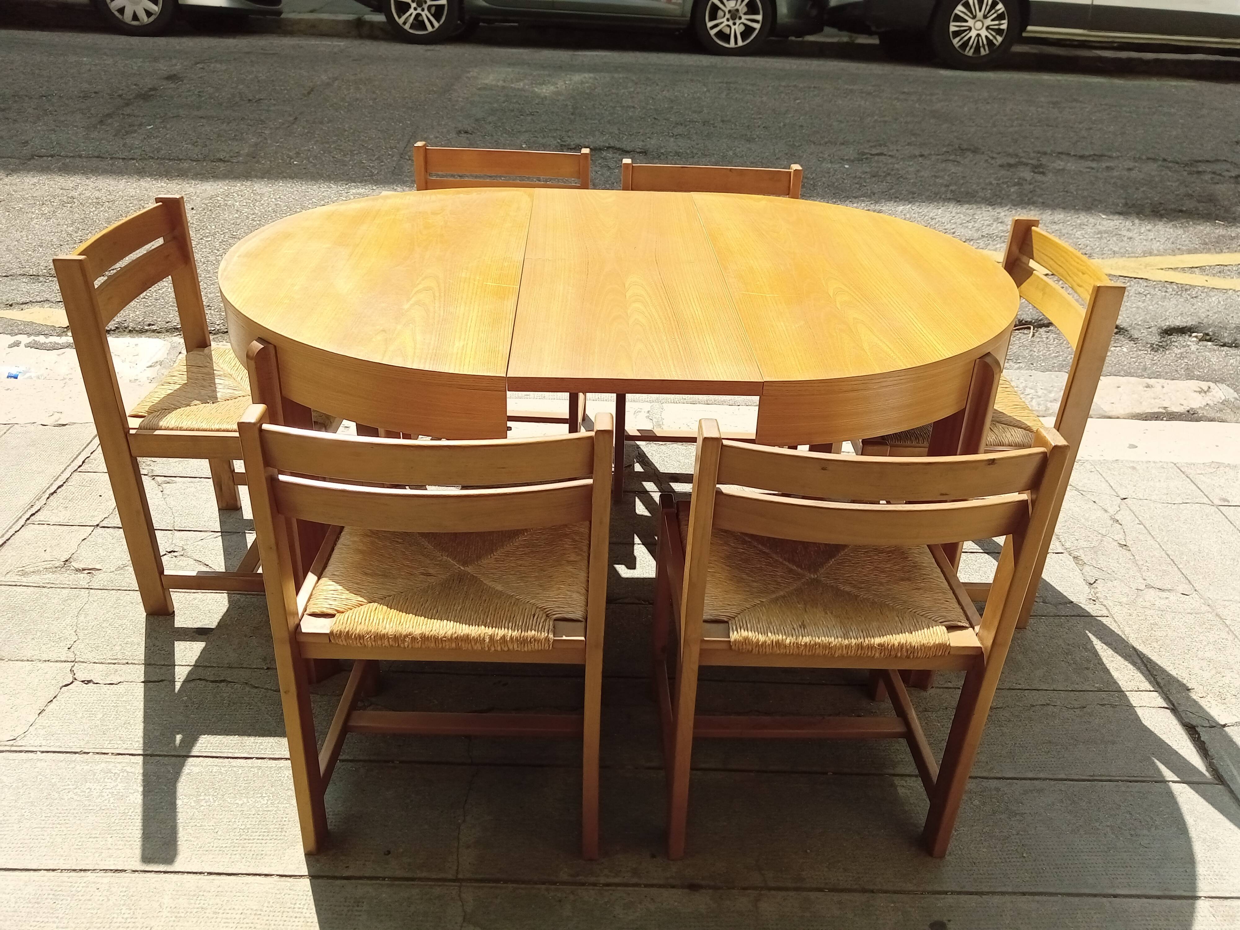 Table and six chairs in elm. Vintage