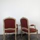 Paire de fauteuils cabriolets rouges de style Louis XV