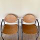 Pair of wooden and steel armchairs, 1980's