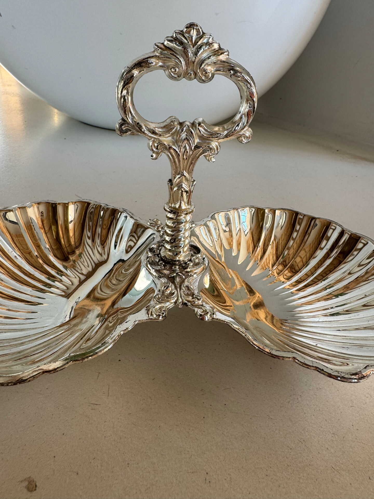 Vintage silver-plated shell display stand