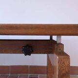 Large solid retractable coffee table