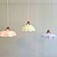 Trio of Art Deco pendant lights in scalloped opaline, 1920-30