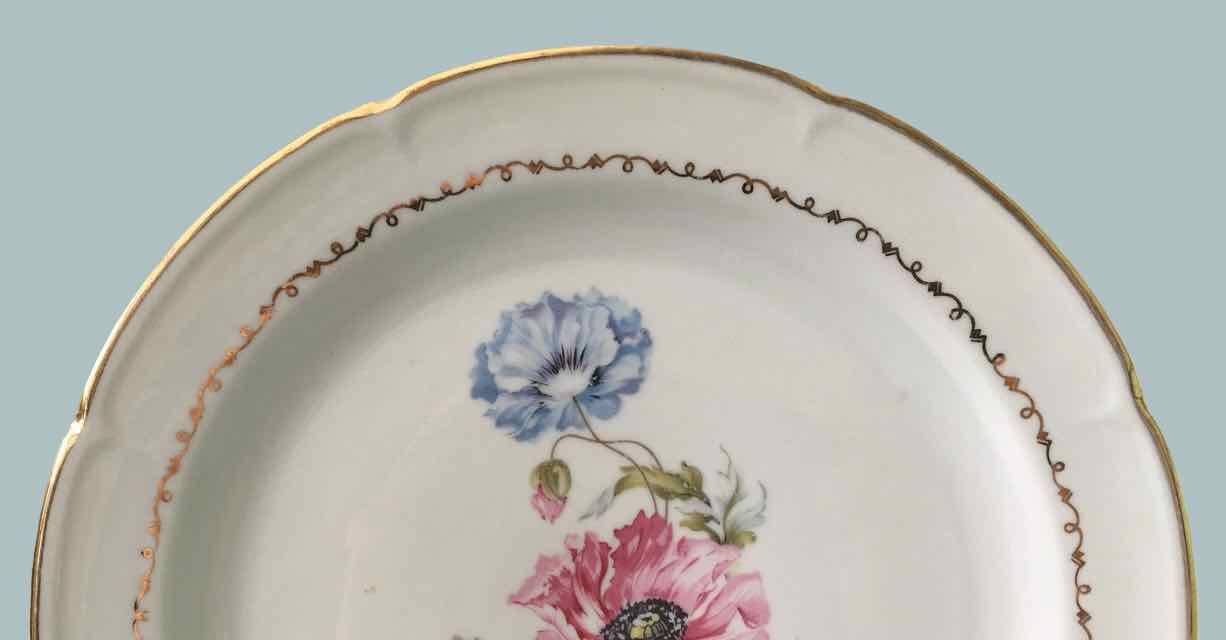 Set of 6 flowered porcelain dinner plates.