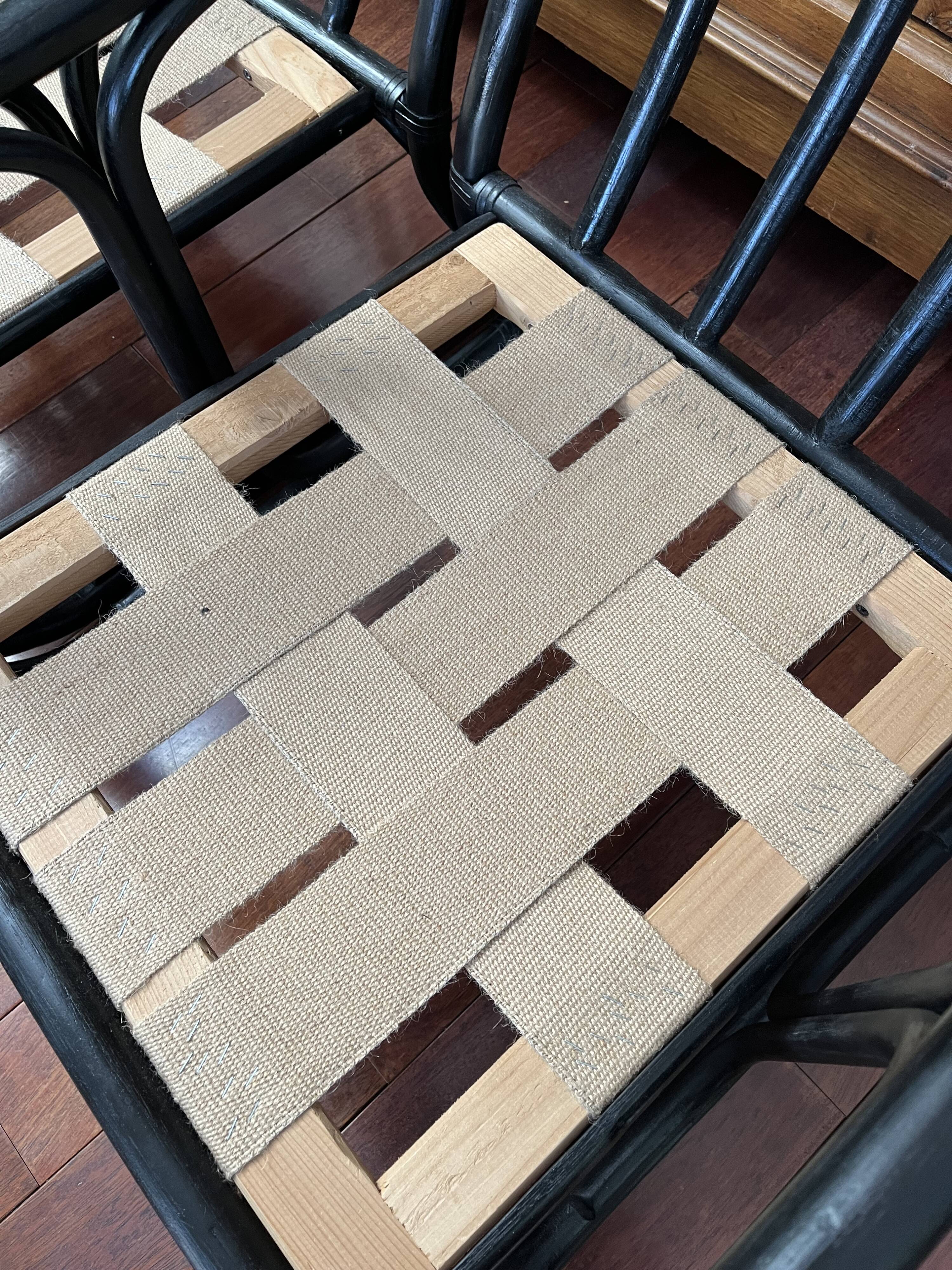 Set of two vintage black and white bamboo chairs.