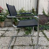 Vintage armchair in black leather