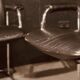 Pair of black leather Scandinavian armchairs