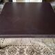 Leather-covered coffee table Roche Bobois