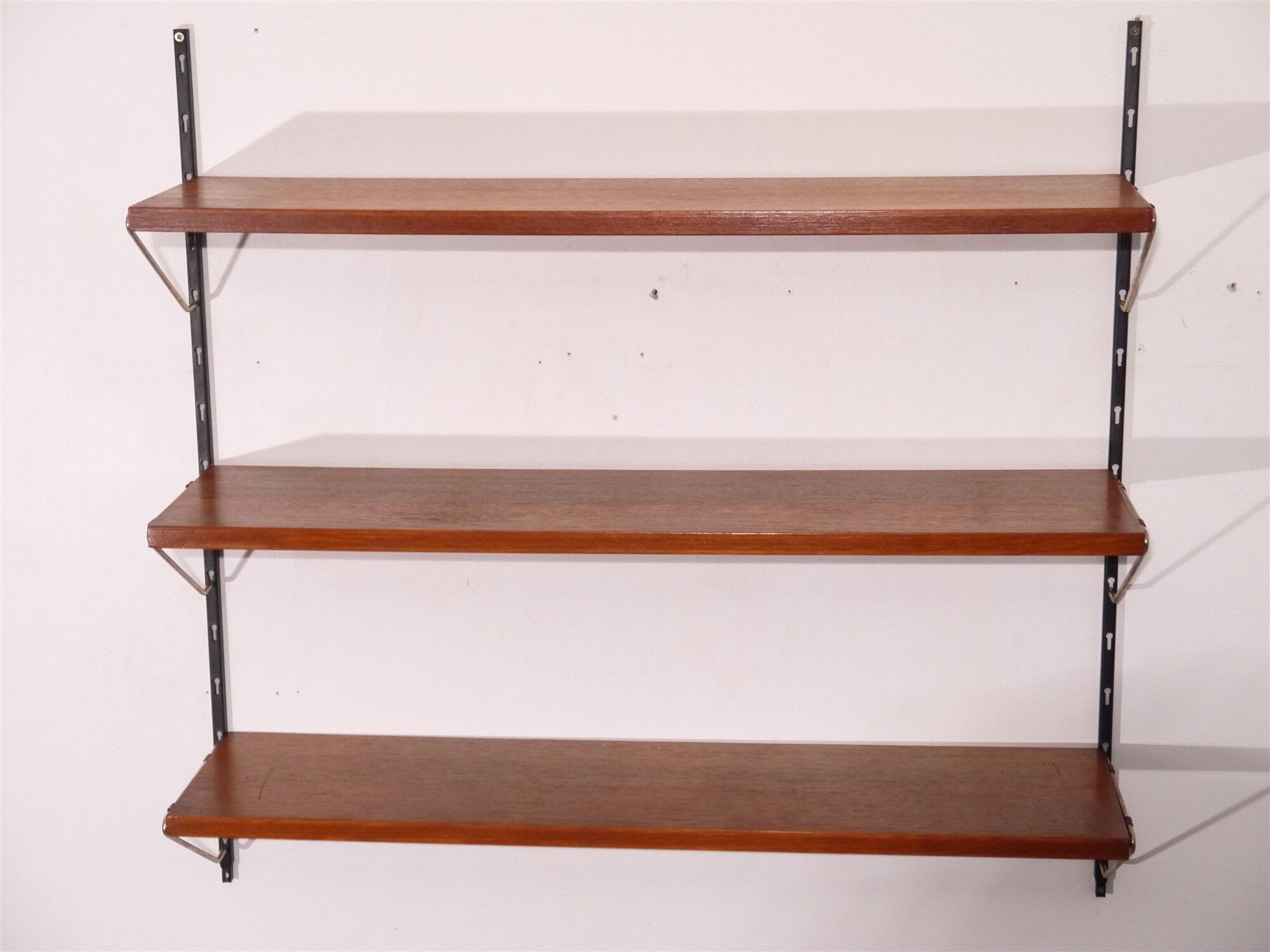 Scandinavian teak and brass metal shelf