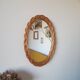 Oval mirror in braided wicker