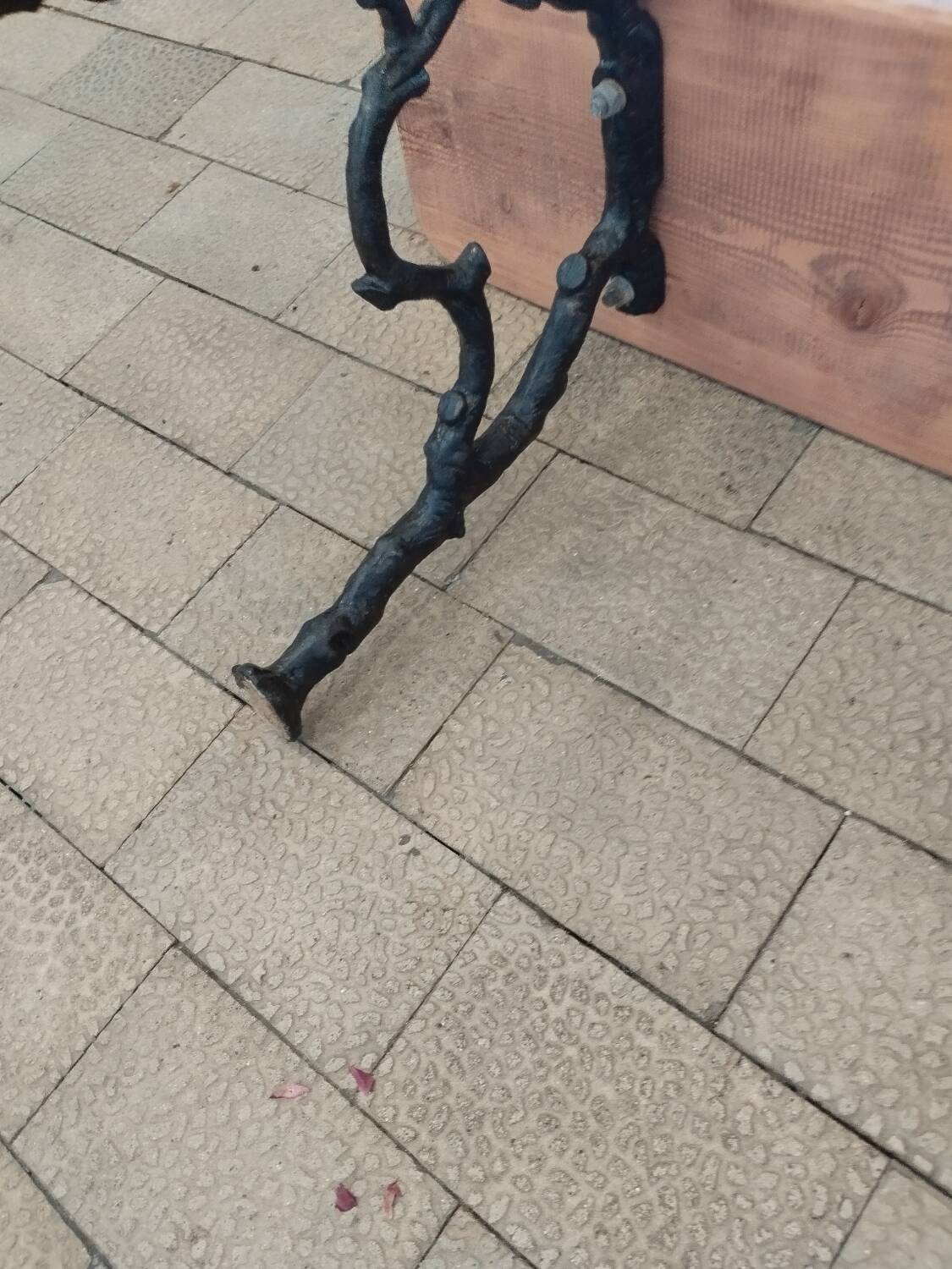 Antique garden bench with cast iron legs