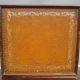 Pair of small flying tables dandy wrapped leather and gold vignette
