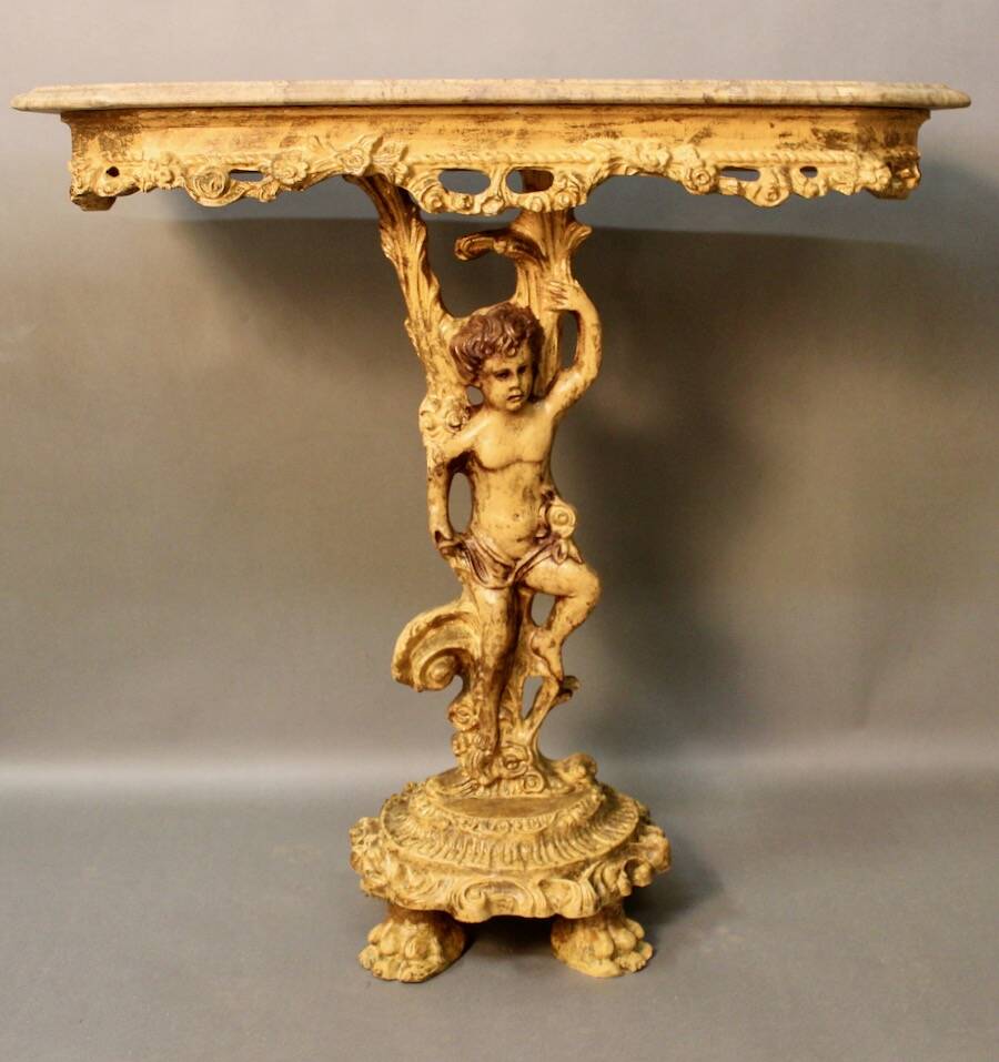 Marble top console and its rocaille style mirror