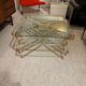Coffee table and its 4 associated nesting tables in plexiglass and gold metal