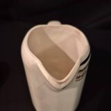 Old covered jug, vintage, geometric frieze and flowers with a border.