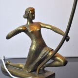 "Woman with the Bow" lamp, Laiton and Opaline, France, midcentury