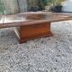 Coffee table with wood marquetry and marble inlays.