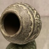 Terracotta vase with green digging patina with animal decoration