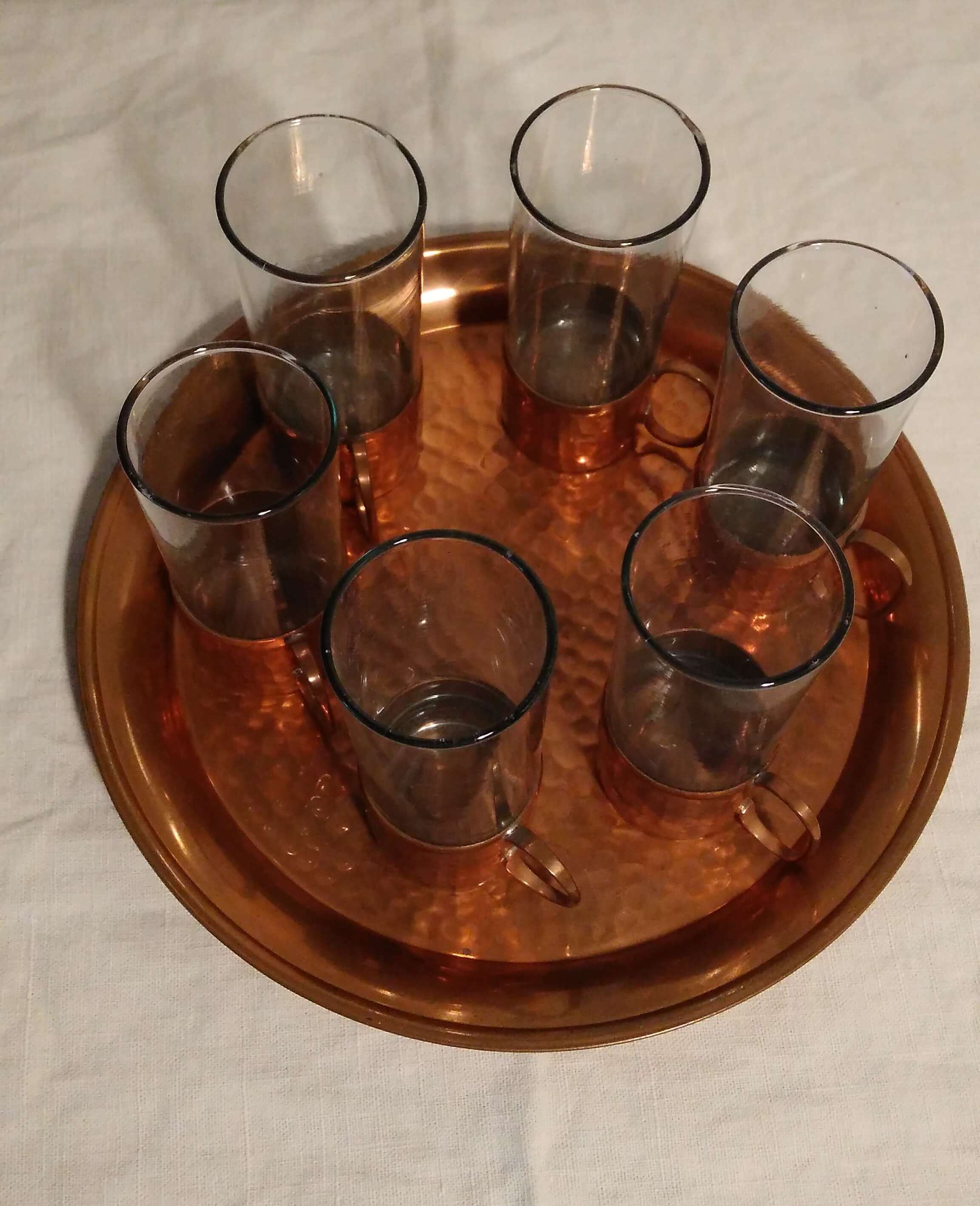Liquor service or glass and copper tea
