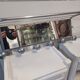 Aluminum wall coat rack with pivoting mirror from the 60s