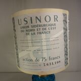 Table lamp with king blue and gold glass foot and machineinor action lampshade