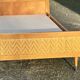 Read a vintage wooden and cane bed, with compass legs – mattress 80 × 190 cm.
