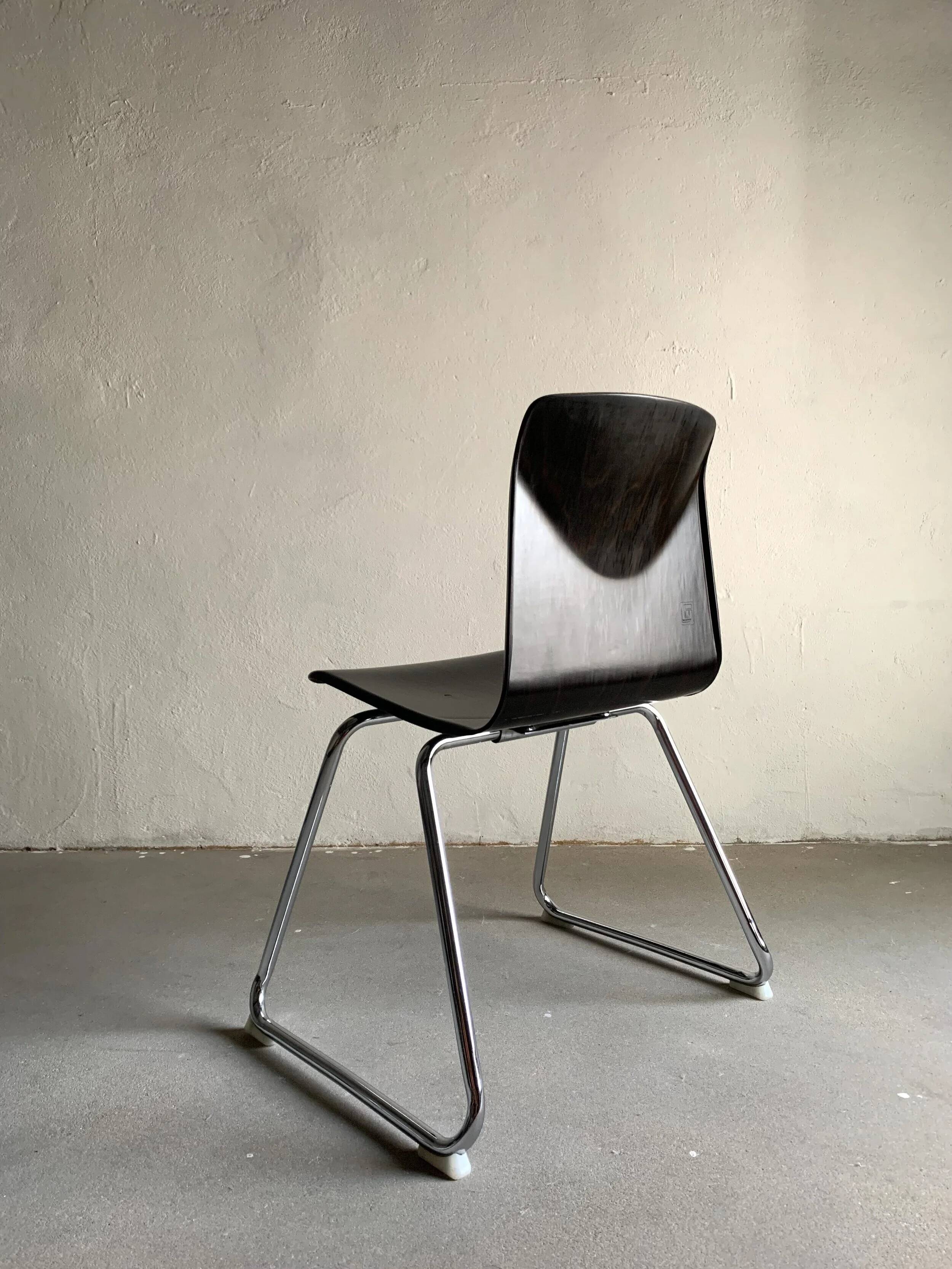 7 chaises de salle à manger empilables en acier tubulaire Pagholtz | Allemagne de l'Ouest | Années 1960