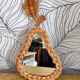 Pear-shaped woven wicker mirror