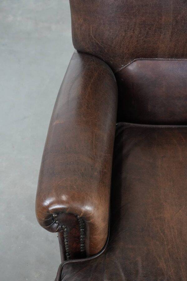 Characterful sheep leather armchair with a beautiful deep colour
