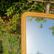 Miroir Louis-Philippe ancien doré patiné