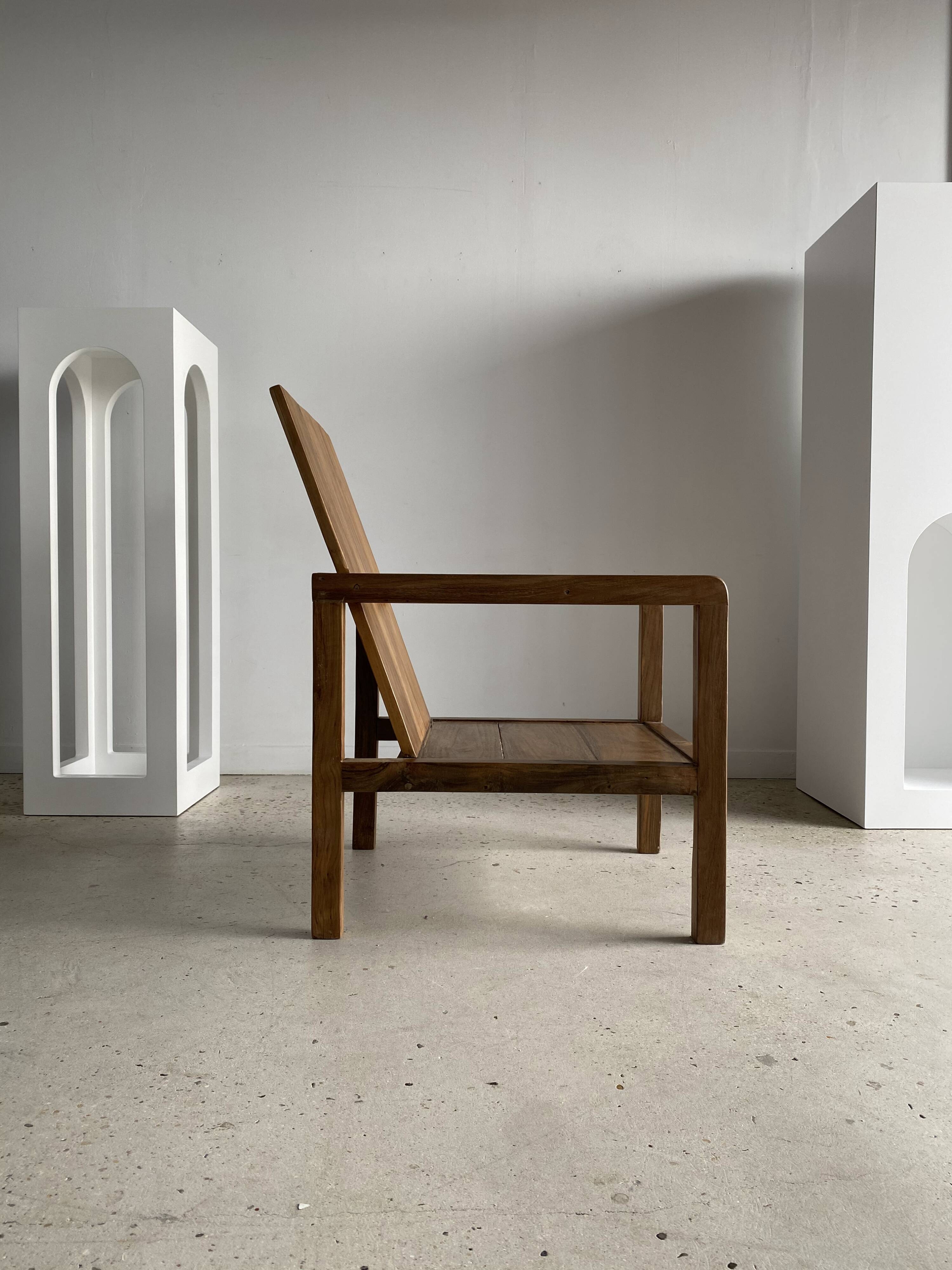 Armchair in natural wood (teak) minimalist design