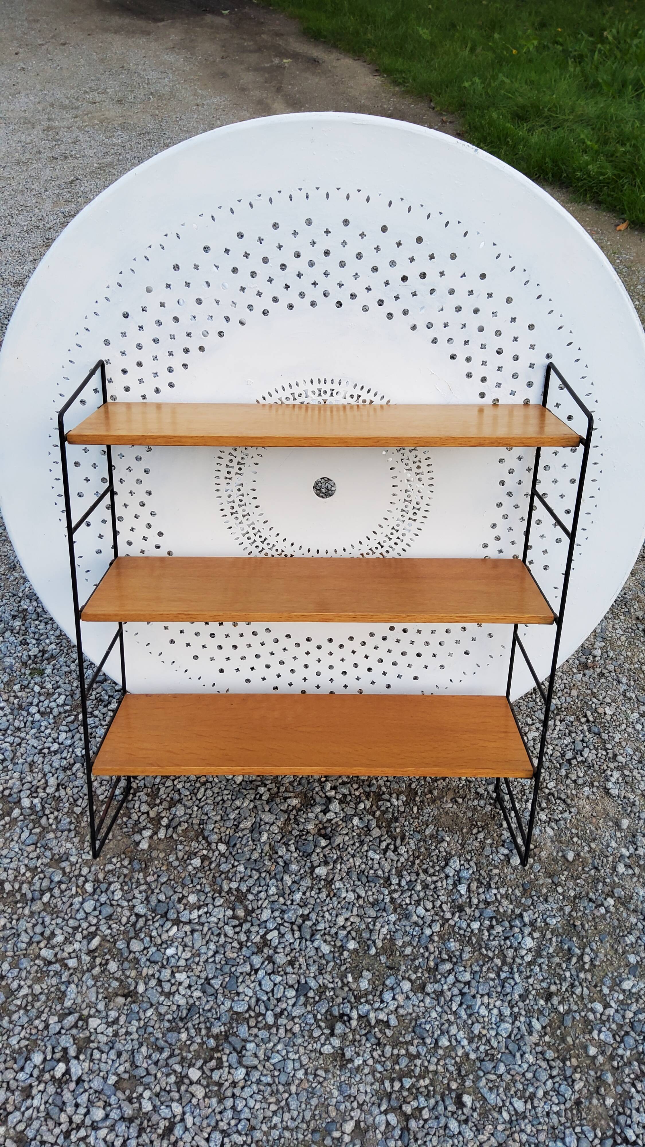 String shelf from the 60s in oak and metal