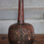 Vintage African wooden carved gourd bottle.