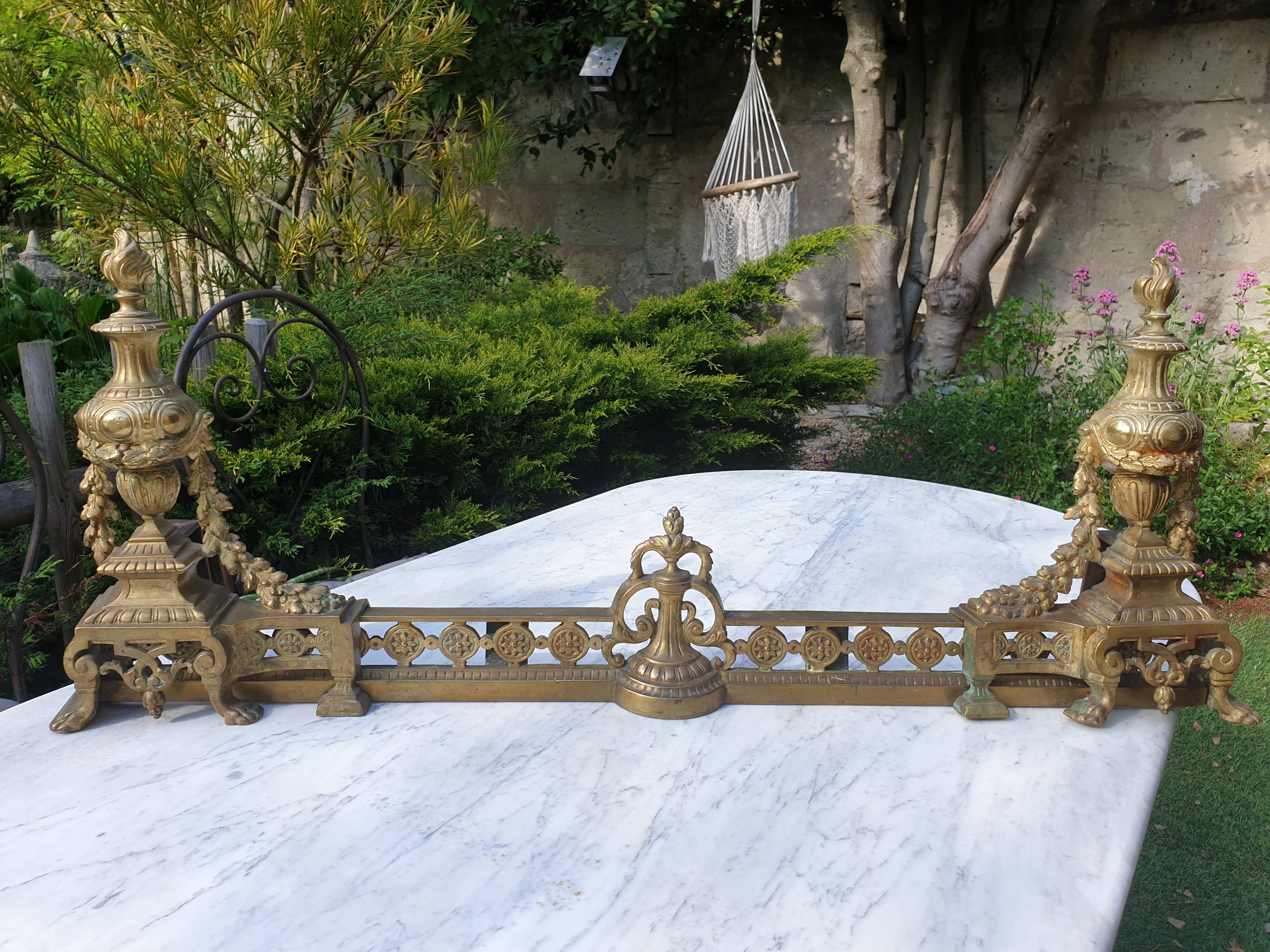 Chenêts and chimney bar in bronze nineteenth century.